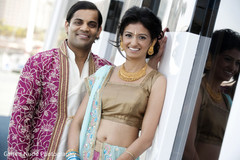 This Indian bride and groom pose for lovely portraits at their sangeet celebration.