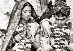 An Indian bride and groom wed in a traditional ceremony.