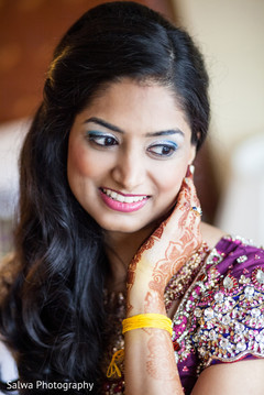 An Indian bride gets ready for some post-wedding fun with some portraits before her reception!