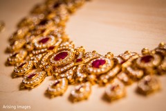 This Indian bride gets all dolled up for her wedding with lovely jewelry.