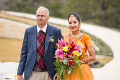 This outdoor Indian wedding is a colorful event.