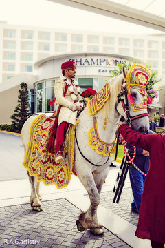 An Indian groom makes his appearance during his baraat.