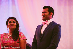 An Indian bride and groom celebrate at their perfect pink reception!