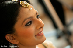 This lovely Indian bride gets all dolled up for her fabulous wedding.