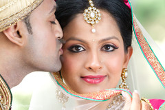 This Indian bride and groom pose for beautiful wedding portraits.