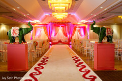 This beautiful Indian wedding ceremony includes lovely floral and decor.