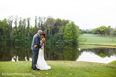 This lovely bride and groom take some wedding portraits after their fusion ceremony!