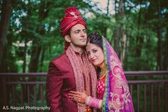 This Indian bride and groom pose for beautiful wedding portraits.