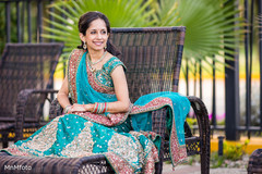 This Indian bride poses for lovely portraits at her sangeet event.