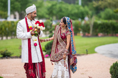 Before their wedding ceremony, this Indian bride and groom pose for lovely portraits.