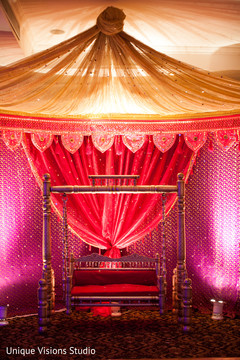 An Indian bride and groom celebrate at their pre-wedding festivities.