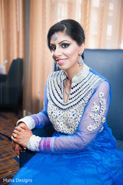 This Indian bride poses for lovely reception portraits.