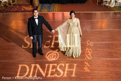 This Indian bride and groom pose for lovely reception portraits.