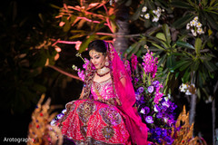 An Indian bride and groom wed in an extravagant night time ceremony in Bangkok, Thailand.