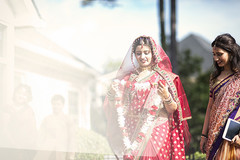 This Indian bride opts for a red sari for her wedding day.