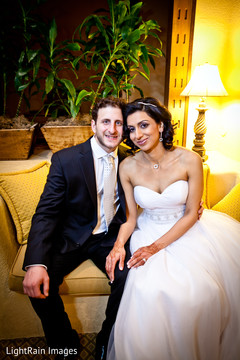 This Indian bride and her groom pose for beautiful portraits.