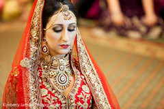 This Indian bride celebrates at her Sikh wedding.