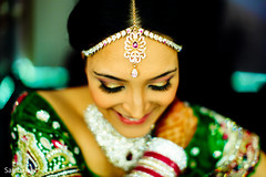 A Punjabi bride gets reading in emerald and hot pink for her big day!