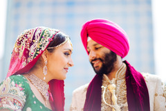 An Indian bride and groom take some sweet portraits after their Sikh ceremony.