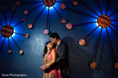 This Indian bride and groom celebrate their wedding with lovely reception portraits.