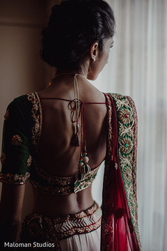 This Indian bride opts for a traditional lengha choli for her wedding day.