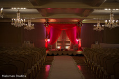 This Indian wedding ceremony includes a beautiful mandap.