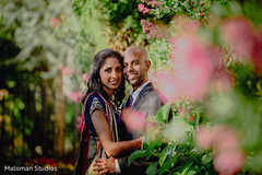 This Indian bride and groom pose for lovely reception portraits.