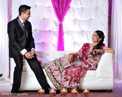 An Indian bride and groom celebrate at their wedding reception!