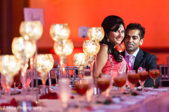 A Pakistani bride and groom celebrate their union at their wedding reception!