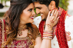 This Indian bride and groom pose for beautiful outdoor portraits.