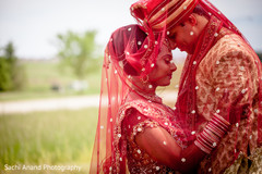 An Indian bride and groom pose for some precious portraits after their wedding!