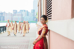 Bride takes portrait.