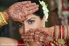 An Indian bridal party poses for pics in Grand Cayman for a destination wedding.