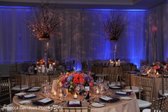 An Indian bride and groom celebrate at their wedding reception in the Grand Cayman.