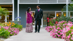 An Indian bride and groom celebrate their union at their wedding reception!