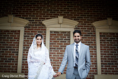 A darling bride and groom are all smiles for their wedding events!