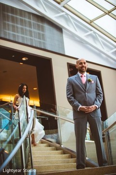 This pair of hearts pose for portraits at their fusion wedding events!