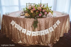 A pair of newlyweds celebrate their love at their darling wedding reception!