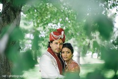 The couple take portraits before wedding.