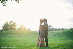 The couple takes pictures before the reception.