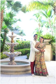 The couple takes outdoor portraits.