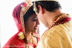 An Indian bride and her groom pose for pics after their wedding ceremony!