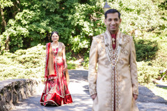 An Indian bride and groom pose for wedding portraits!