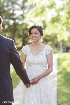 An Indian bride and groom pose for wedding portraits!