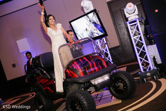 An Indian bride and groom celebrate at their wedding reception!