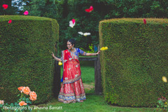 An Indian bride and groom pose of wedding portraits!