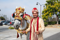 The groom arrives on a horse!