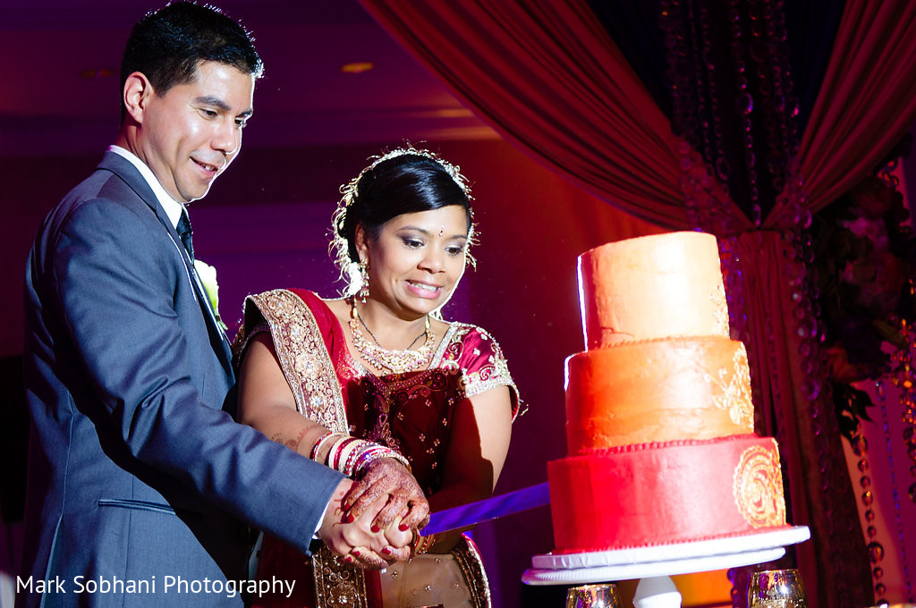 cake-cutting-in-san-antonio-tx-indian-fusion-wedding-by-mark-sobhani