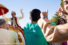 The groom arrives in style!