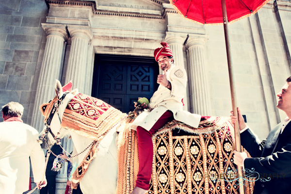 An Indian groom arrives to his modern Indian wedding.